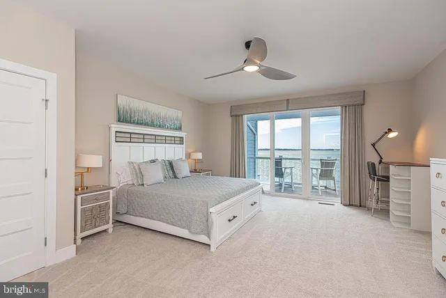a view of hallway with wooden floor