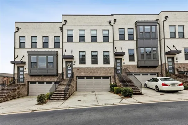 a view of a hallway with windows