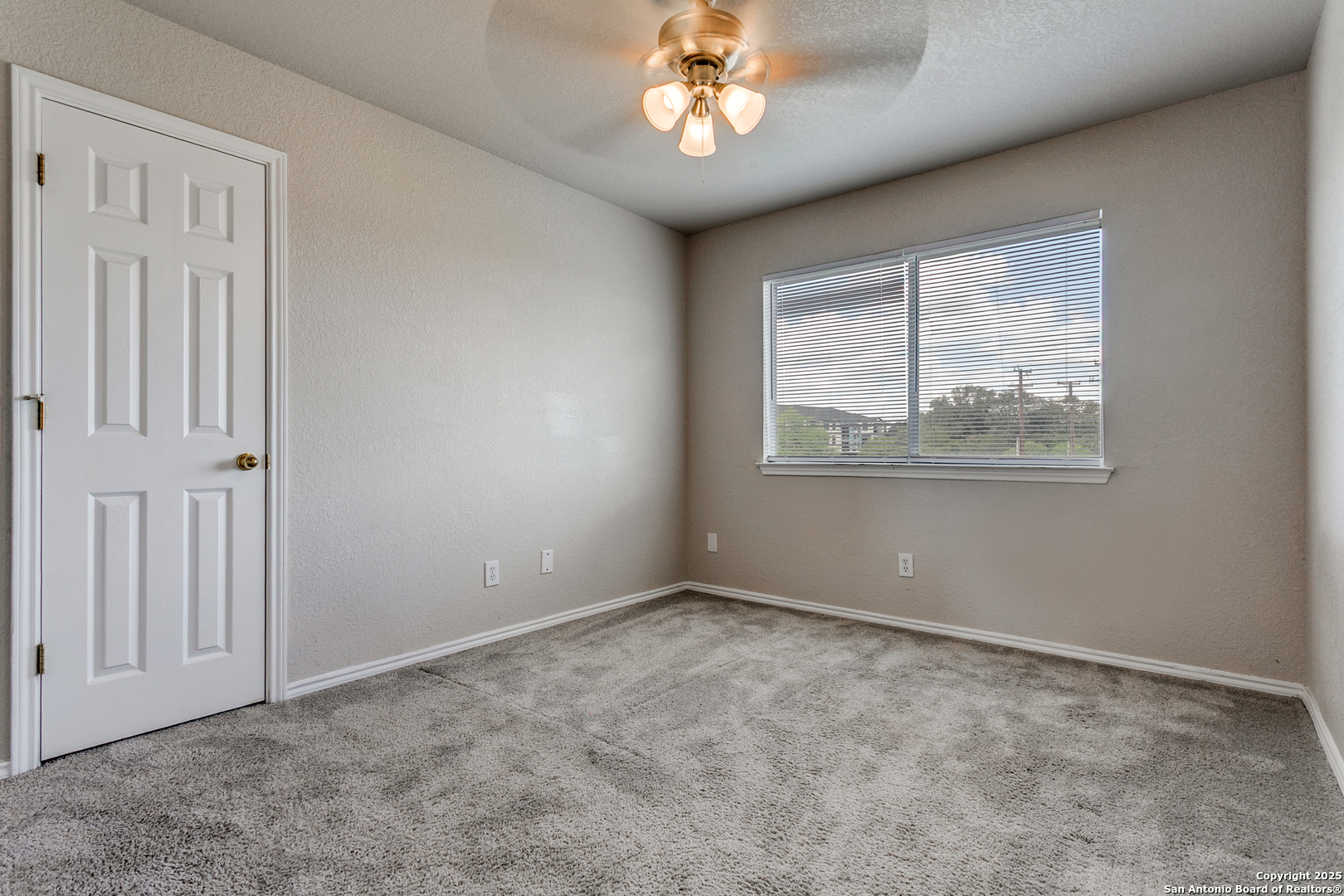 21715 Hanover Crest San Antonio, TX 78259 - Photo 19 of 25 an empty room with a window