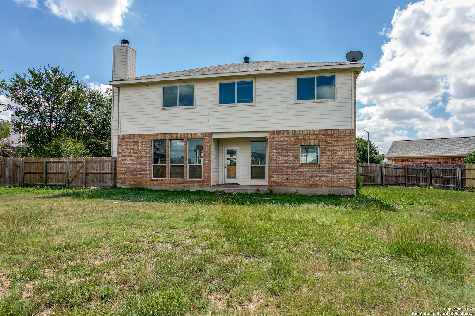 21715 Hanover Crest San Antonio, TX 78259 - Photo 23 of 25 a front view of a house with a garden