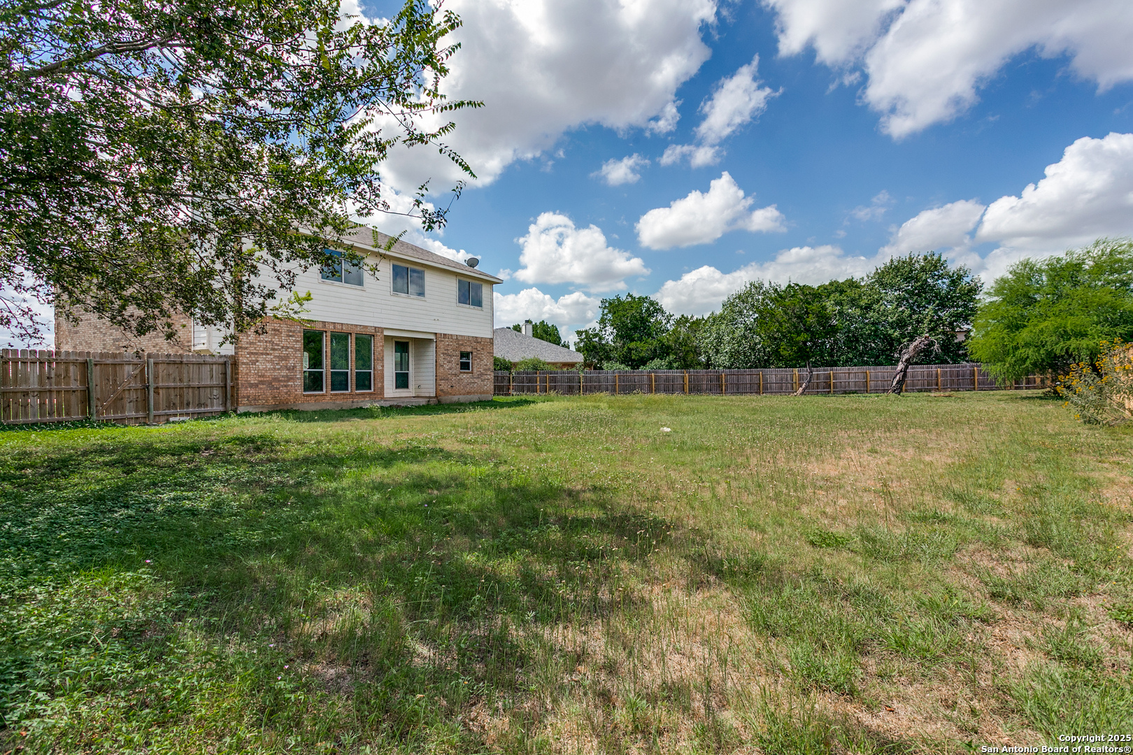 21715 Hanover Crest San Antonio, TX 78259 - Photo 25 of 25 a view of a house with a big yard