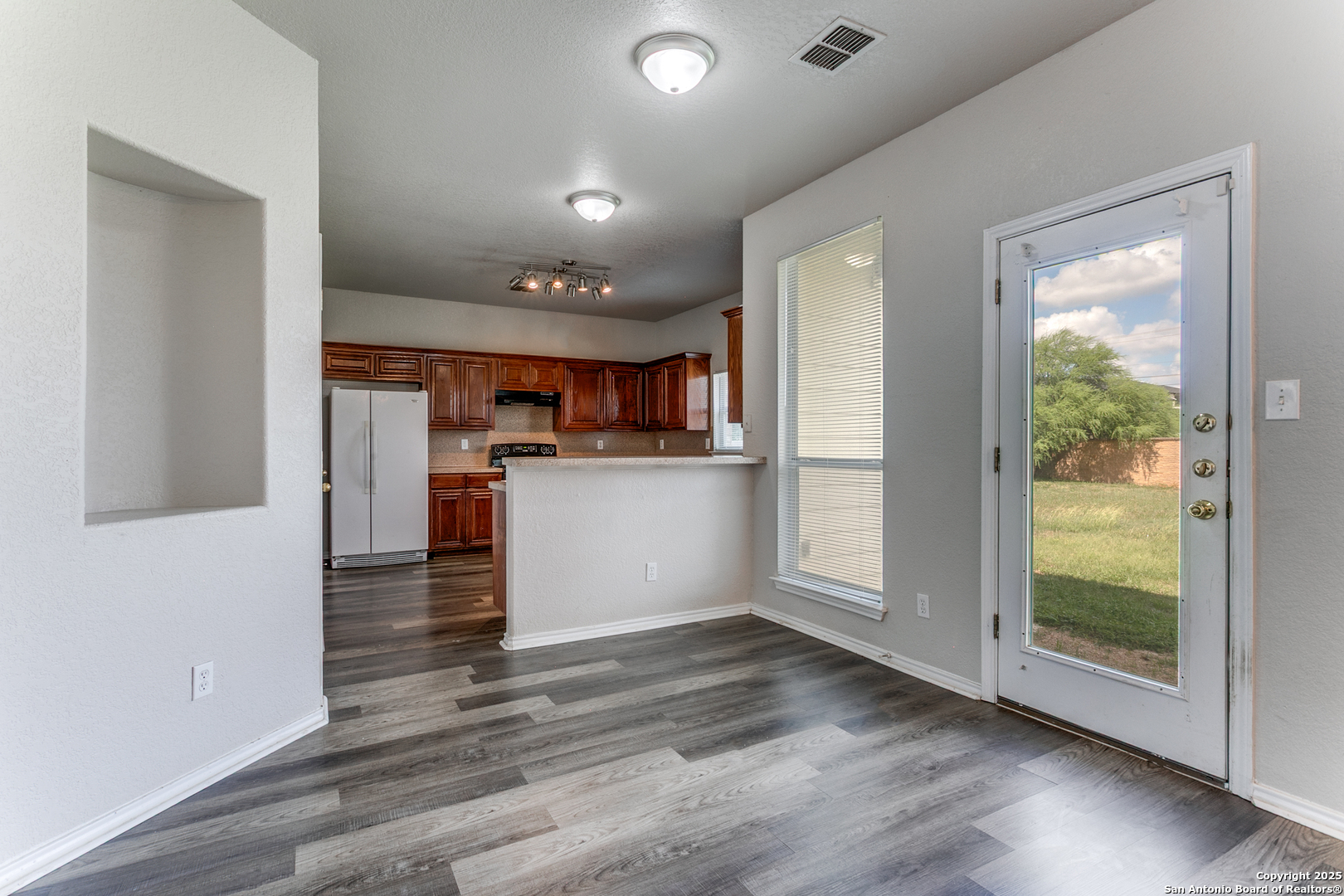 21715 Hanover Crest San Antonio, TX 78259 - Photo 10 of 25 a view of kitchen with wooden floor