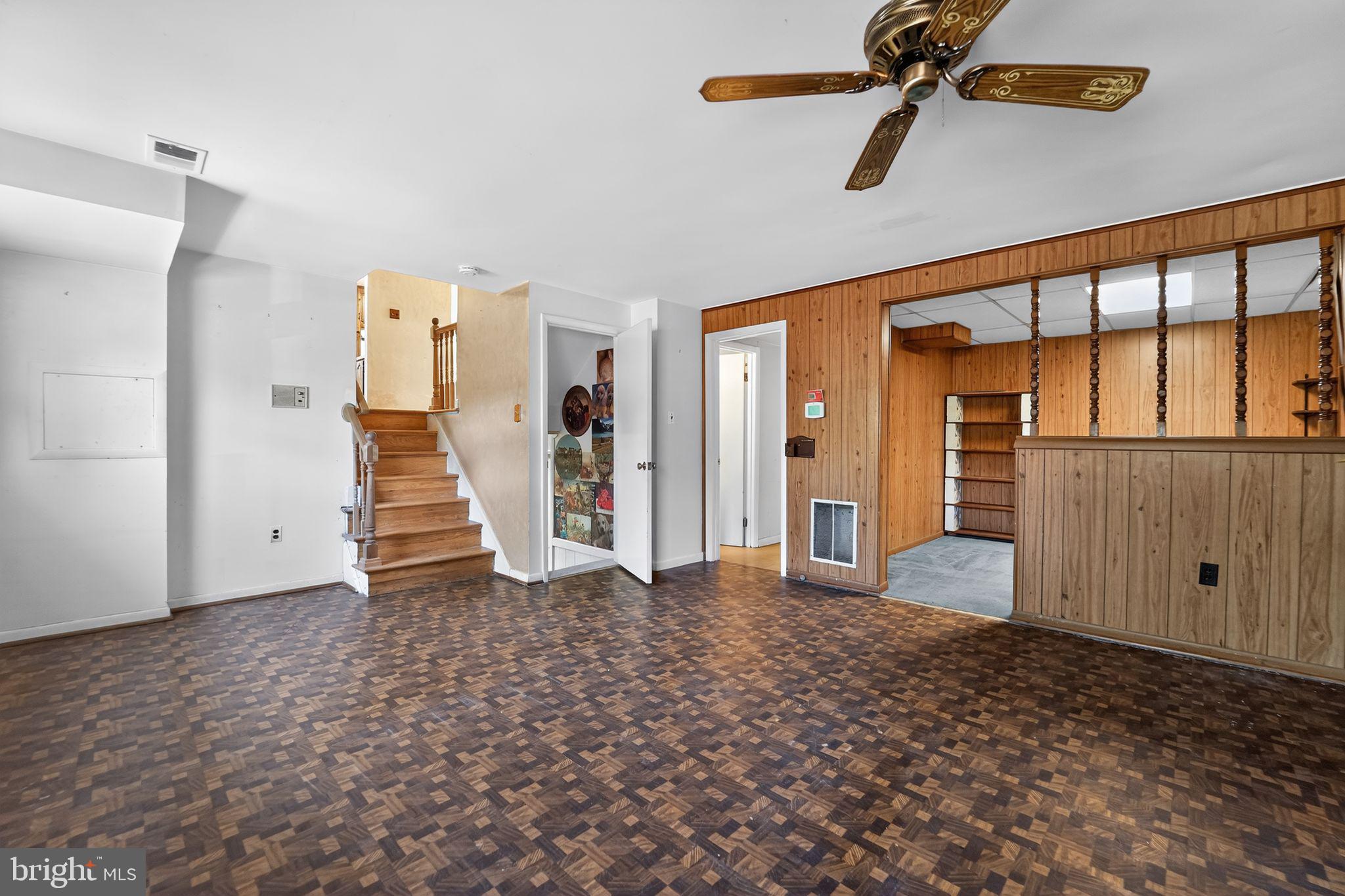 7012 Redmiles Road Laurel, MD 20707 - Photo 11 of 31 wooden floor in an empty room