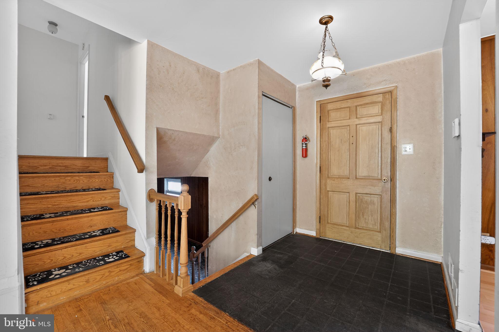 7012 Redmiles Road Laurel, MD 20707 - Photo 3 of 31 a view of a hallway with stairs