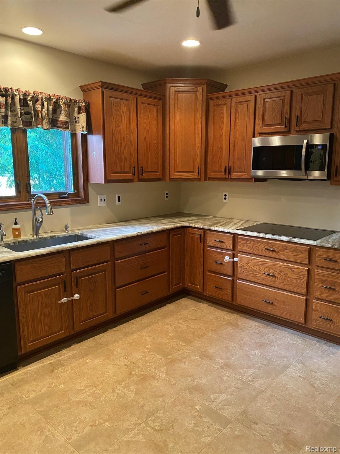36904 Goddard Road Romulus, MI 48174 - Photo 11 of 25 Large kitchen with heated floors