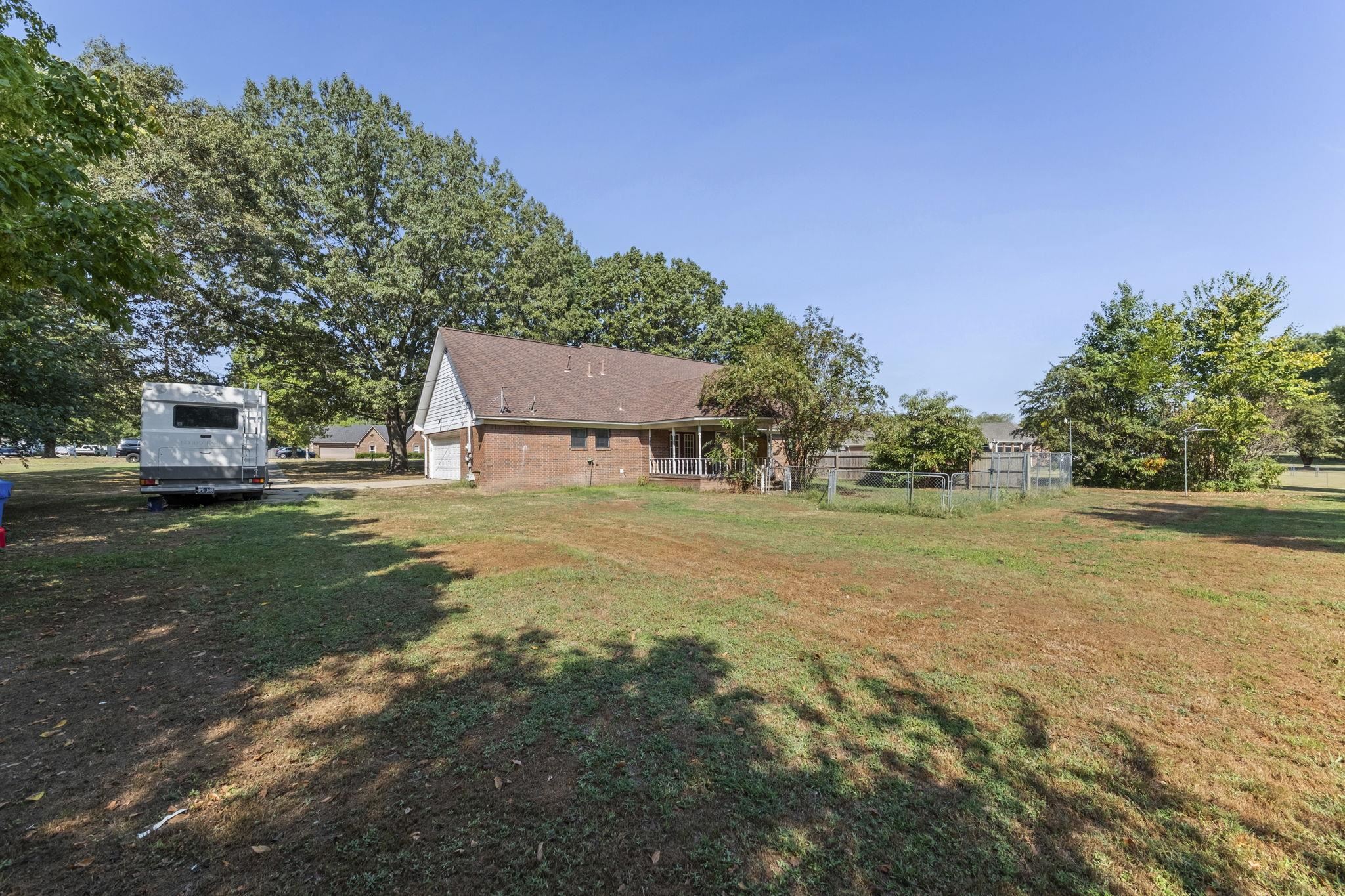 143 Ashley Lane Brighton, TN 38011 - Photo 27 of 37 View of yard with a garage
