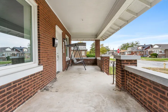 a view of a porch with furniture
