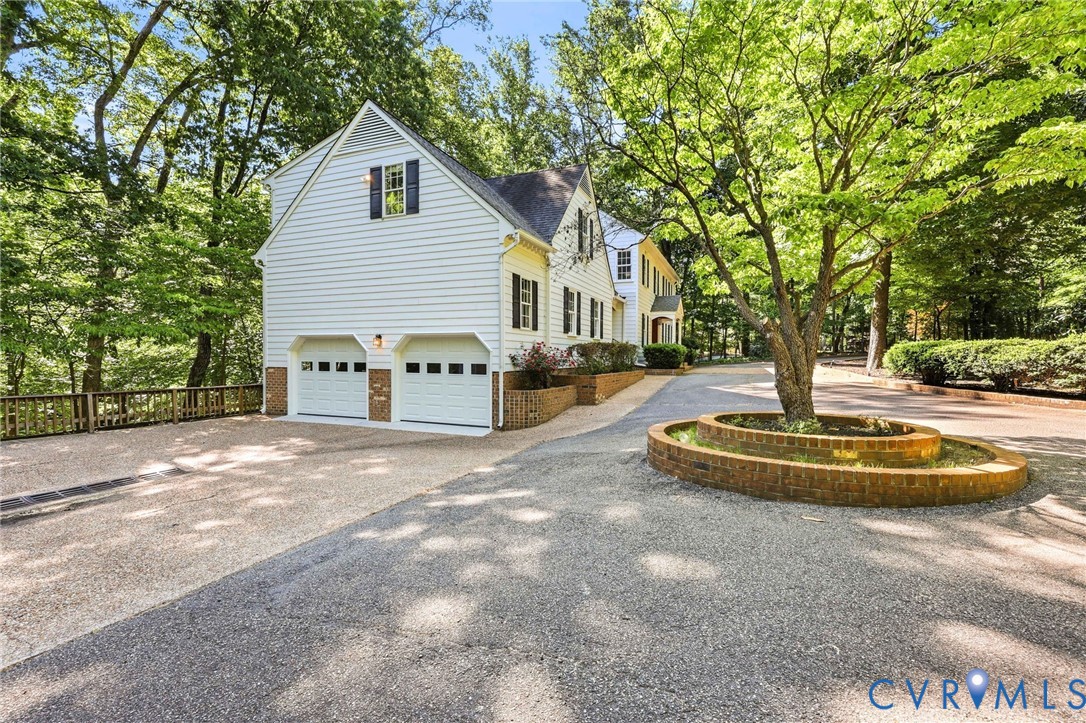 3201 East Brigstock Road Midlothian, VA 23113 - Photo 2 of 72 a view of a house with backyard and trees