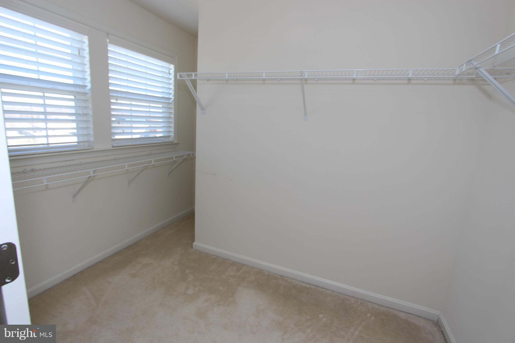 22629 Hawkbill Square Ashburn, VA 20148 - Photo 11 of 30 a room that has a window in it