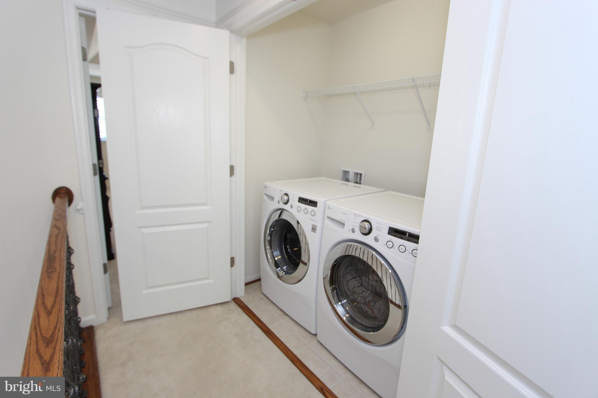 22629 Hawkbill Square Ashburn, VA 20148 - Photo 12 of 30 a utility room with dryer and washer