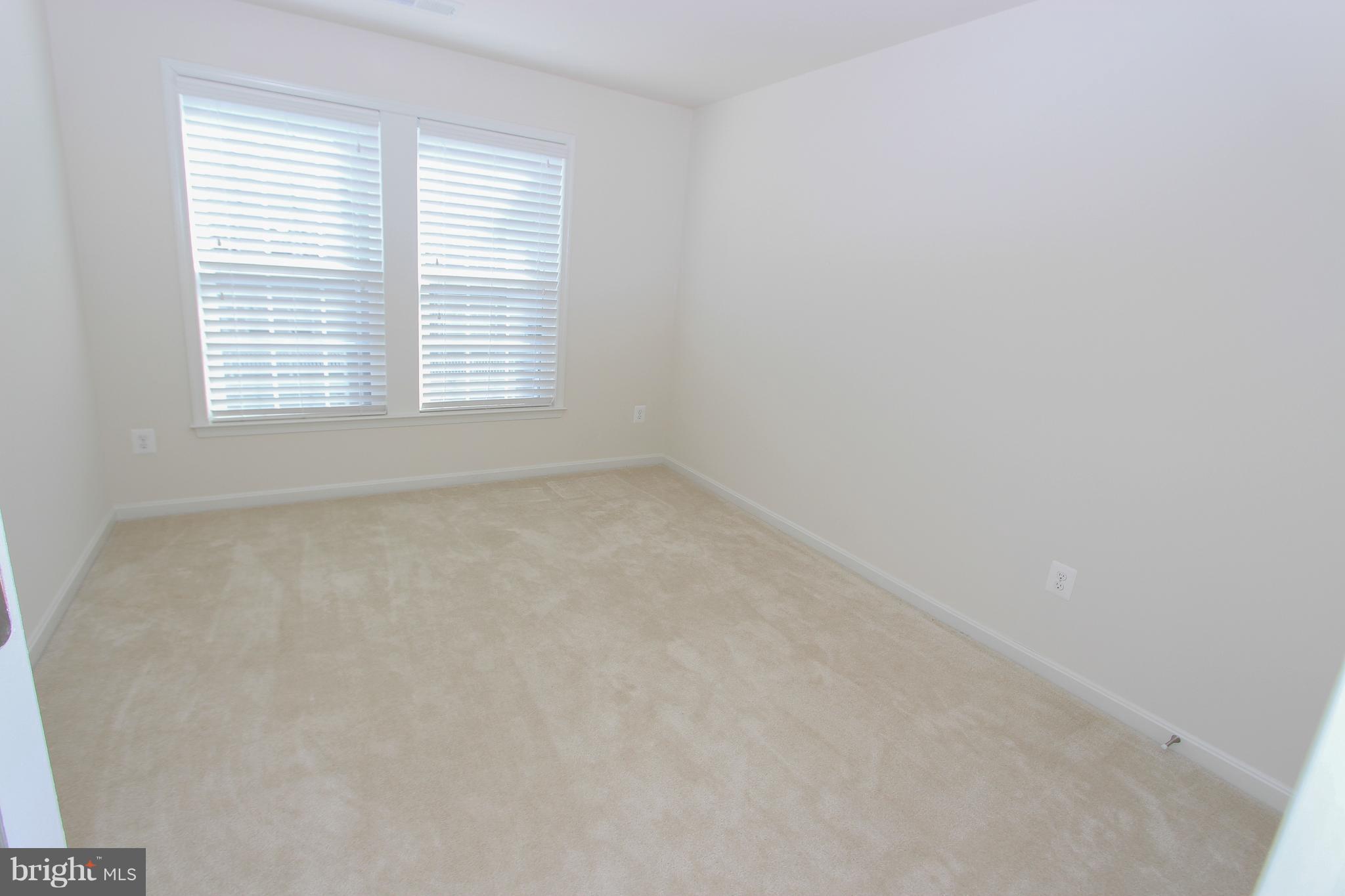 22629 Hawkbill Square Ashburn, VA 20148 - Photo 13 of 30 an empty room with a window