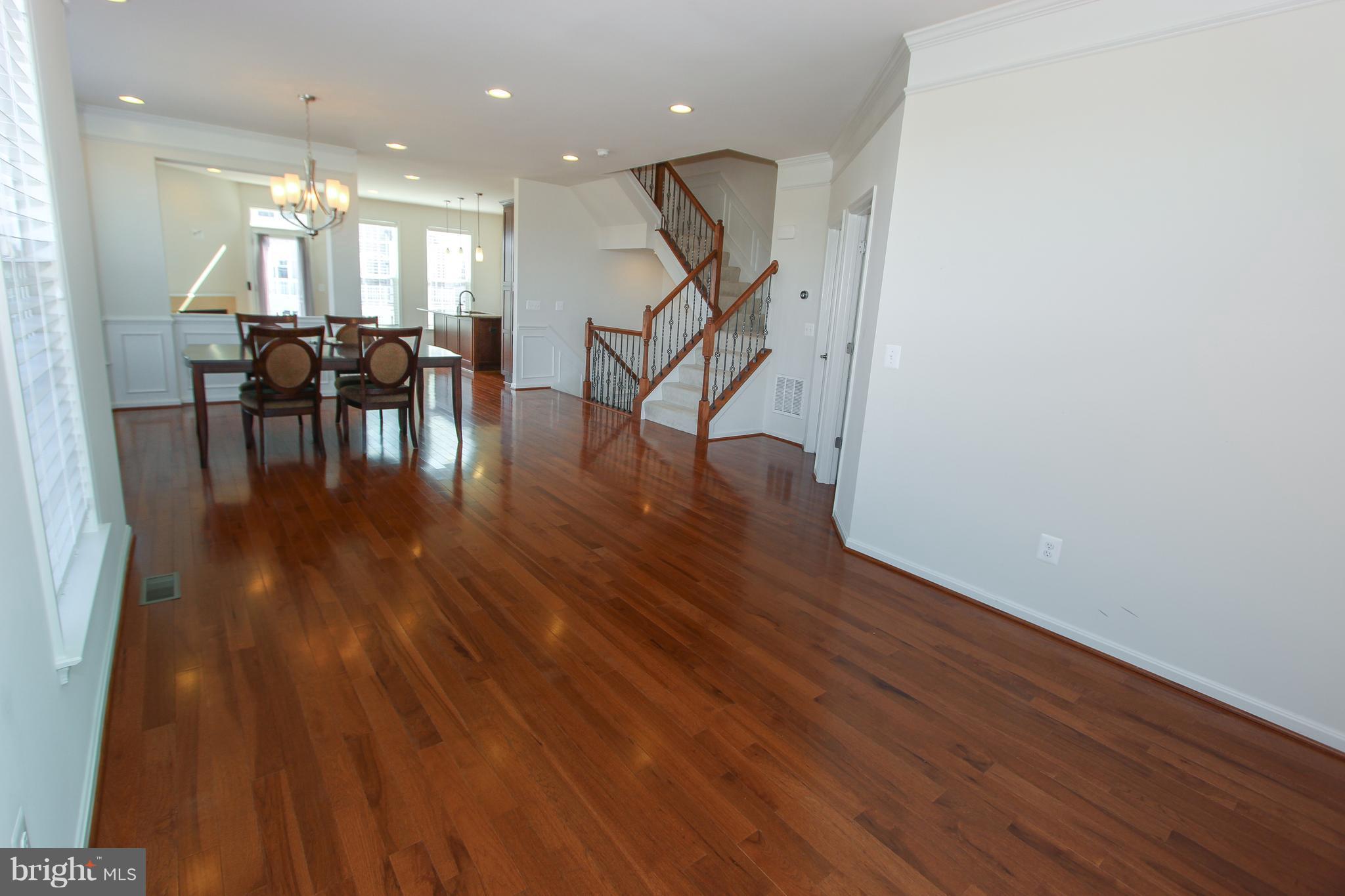 22629 Hawkbill Square Ashburn, VA 20148 - Photo 22 of 30 a view of dining room with furniture and wooden floor