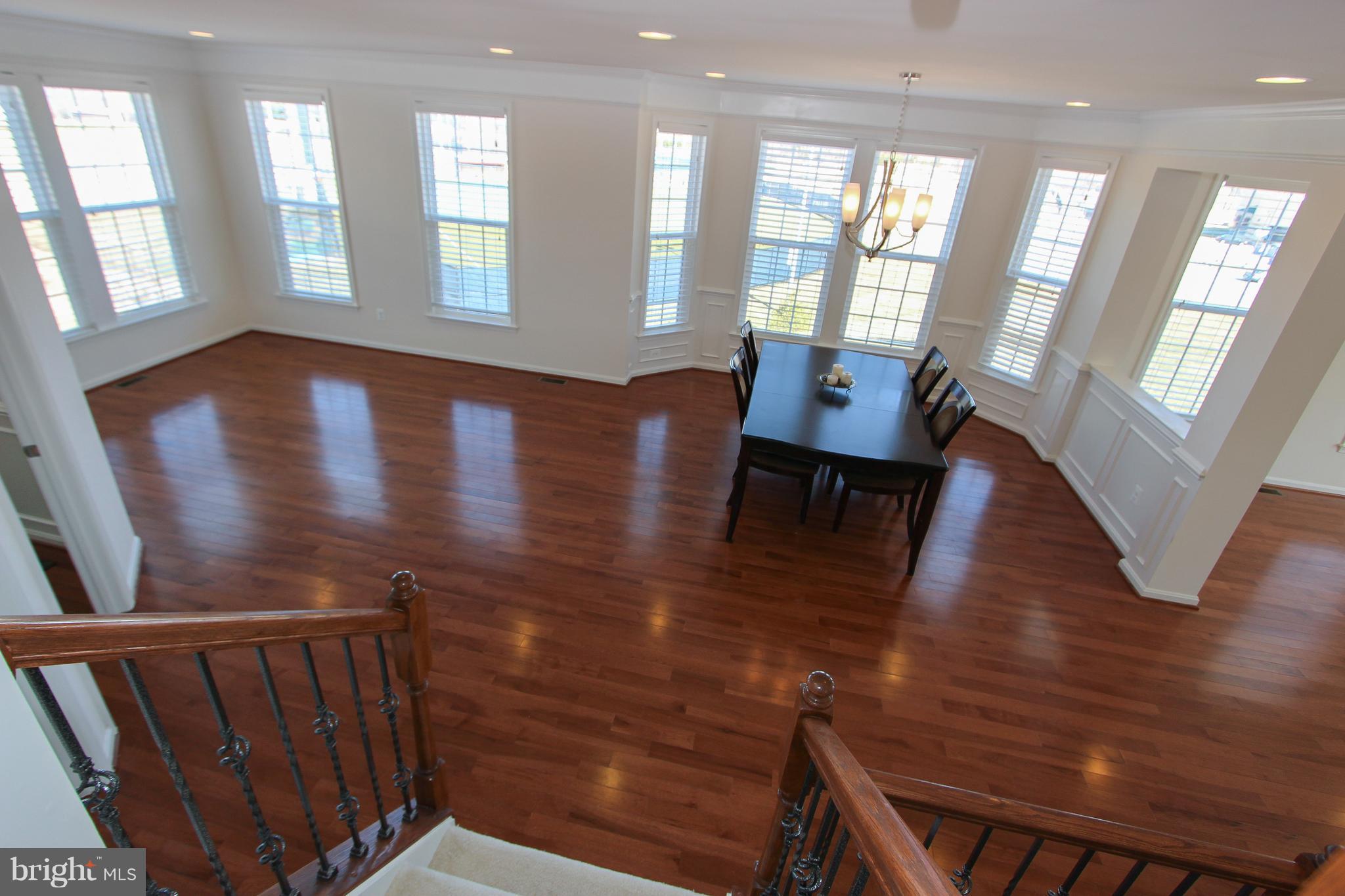 22629 Hawkbill Square Ashburn, VA 20148 - Photo 26 of 30 a view of hallway with furniture and wooden floor