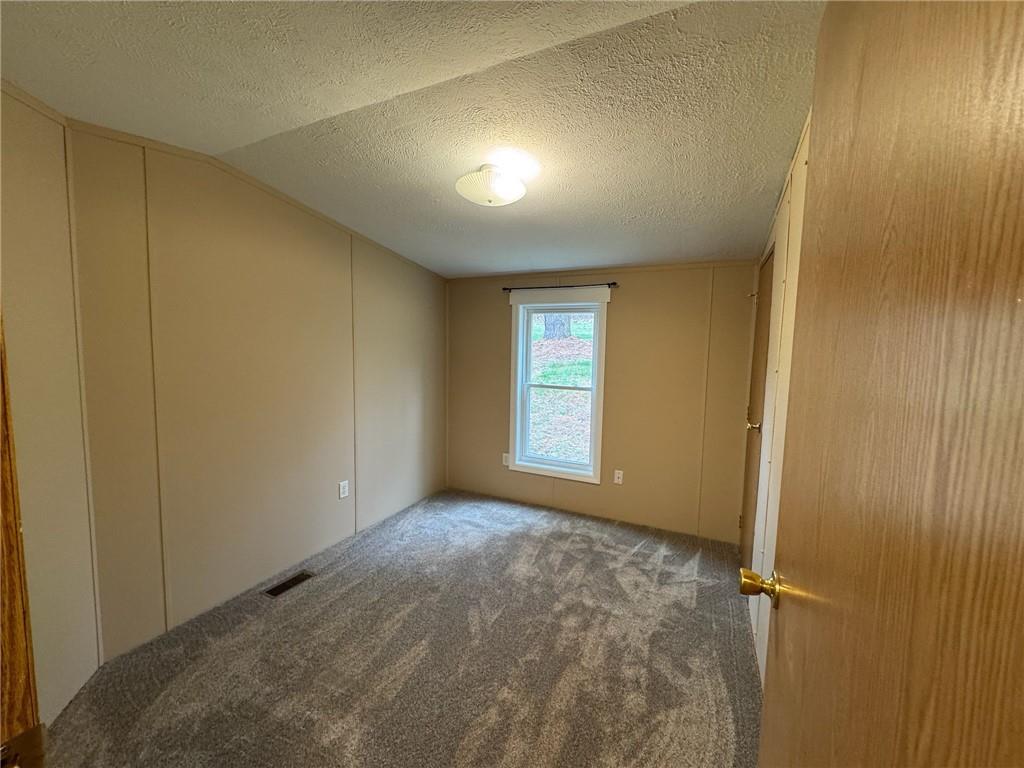 220 Heller Road Butler, PA 16002 - Photo 12 of 17 a view of an empty room and window