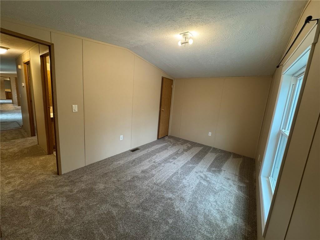 220 Heller Road Butler, PA 16002 - Photo 15 of 17 an empty room with a natural light