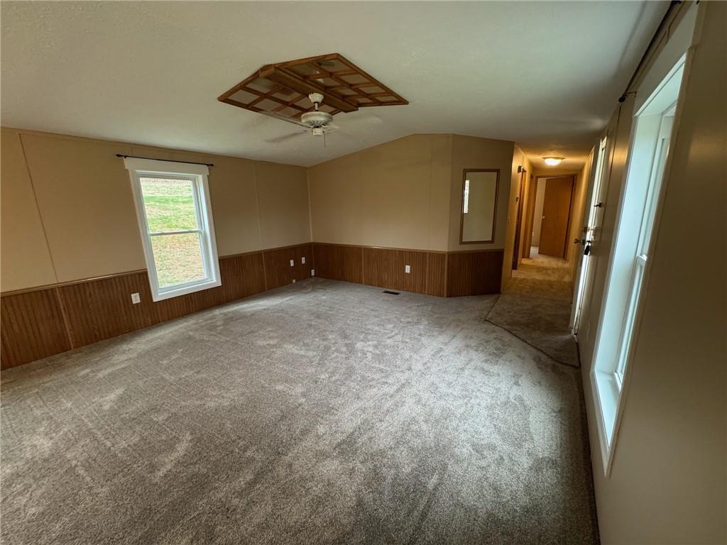 220 Heller Road Butler, PA 16002 - Photo 5 of 17 a view of an empty room with a fireplace