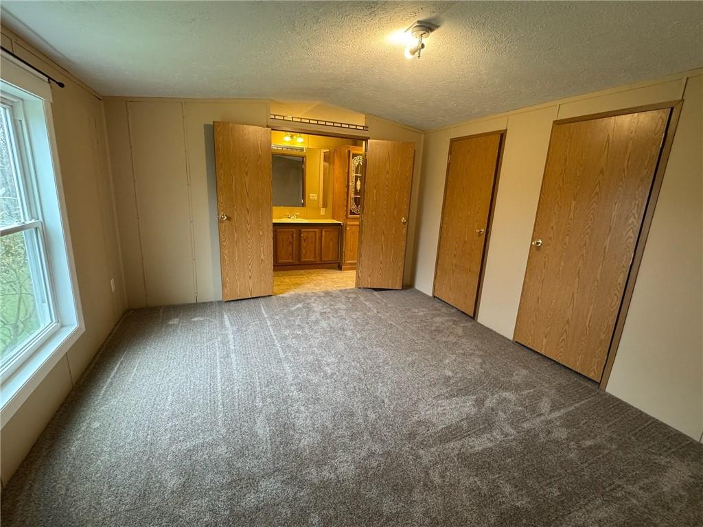 220 Heller Road Butler, PA 16002 - Photo 10 of 17 a view of empty room with wooden floor