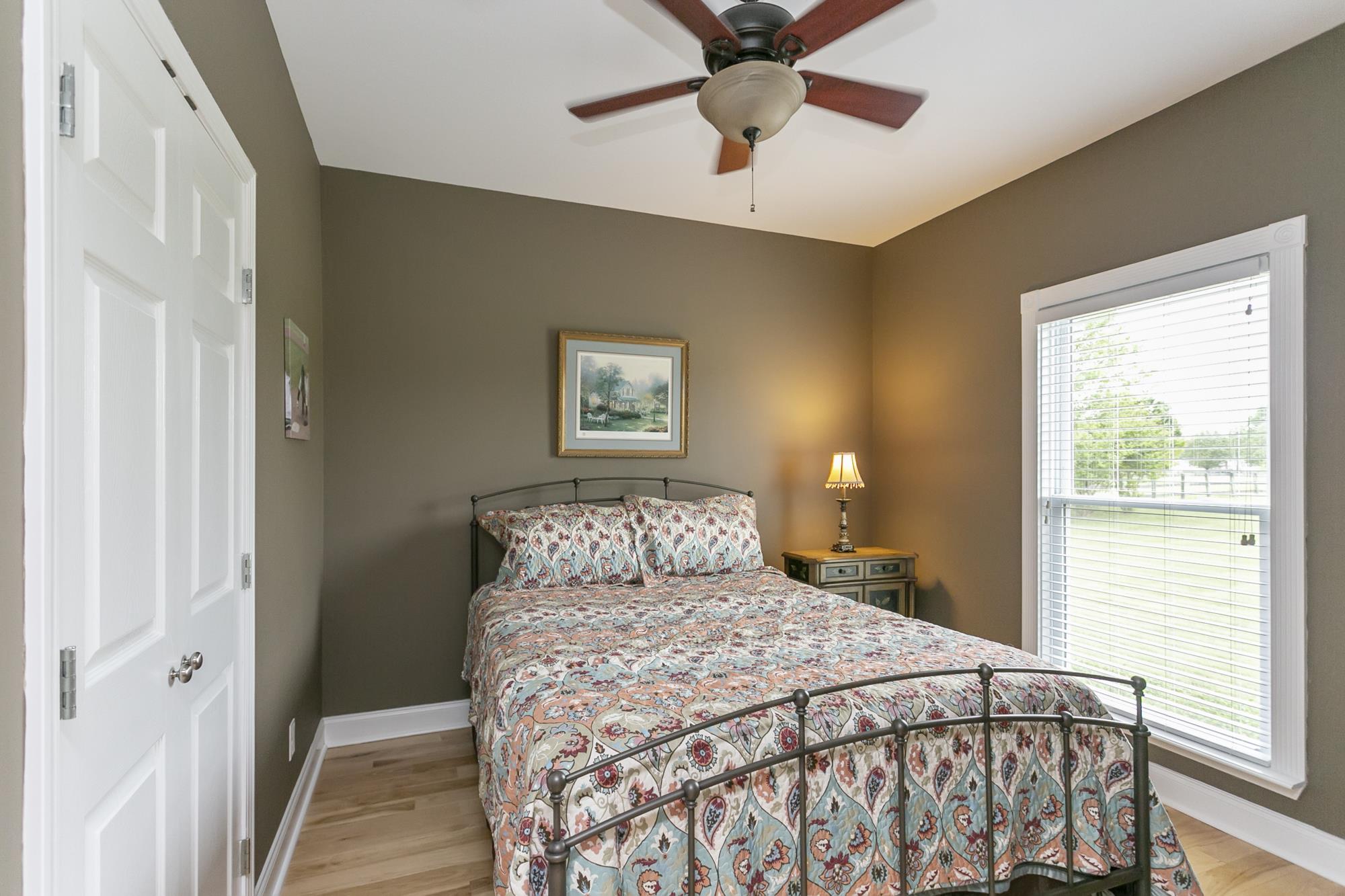 5154 Youngville Road Springfield, TN 37172 - Photo 13 of 30 a bedroom with a bed and a window