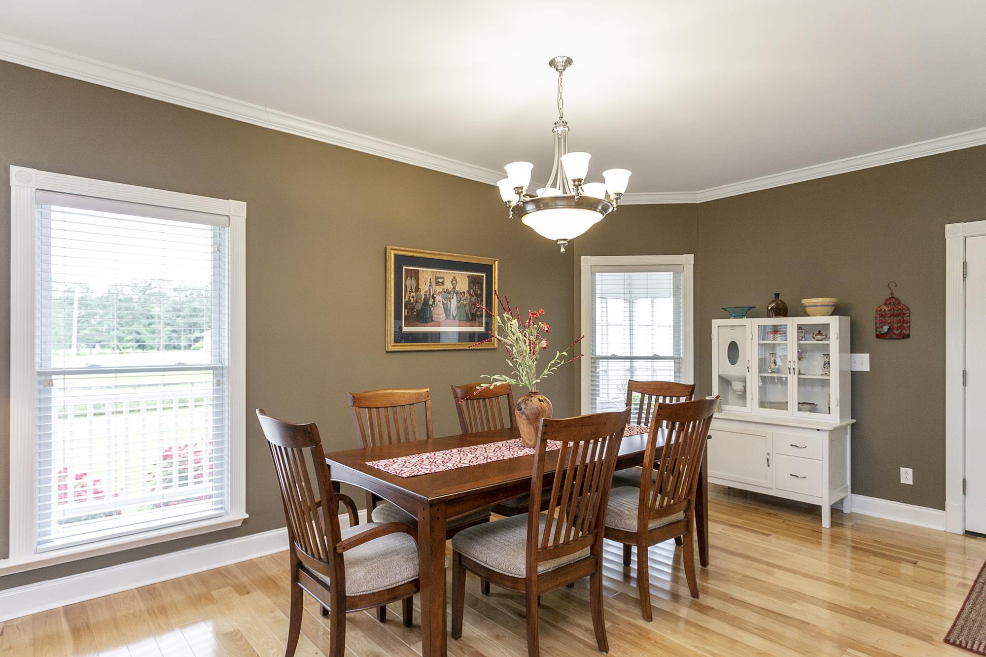 5154 Youngville Road Springfield, TN 37172 - Photo 8 of 30 a view of a dining room with furniture window and wooden floor