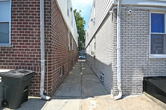 a view of a pathway both side of building