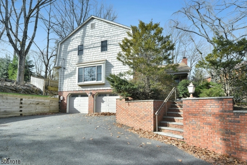 600 North Monroe Street Ridgewood, NJ 07450 - Photo 2 of 18 front view of a house with a street