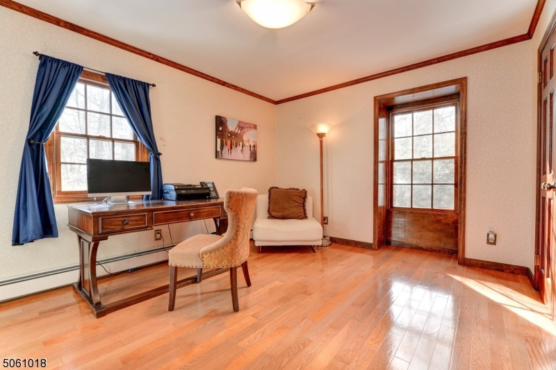 600 North Monroe Street Ridgewood, NJ 07450 - Photo 15 of 18 a living room with furniture and a window