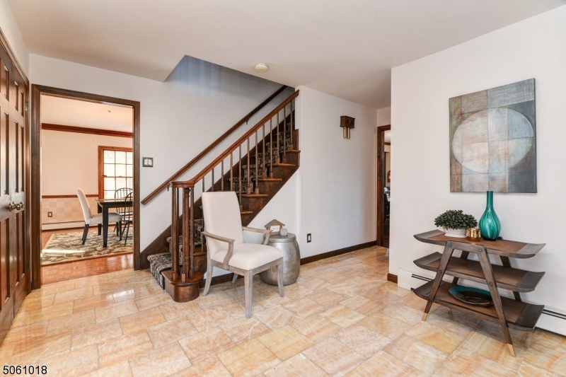600 North Monroe Street Ridgewood, NJ 07450 - Photo 3 of 18 a living room with chairs and a rug
