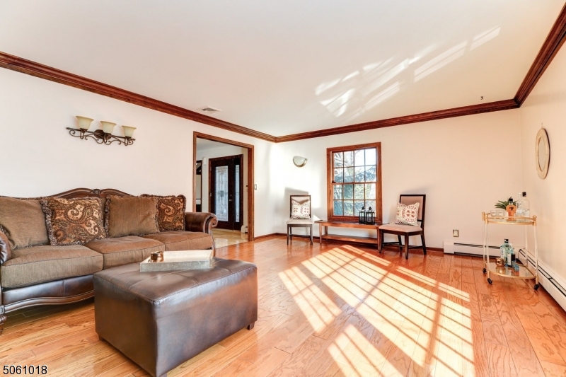 600 North Monroe Street Ridgewood, NJ 07450 - Photo 4 of 18 a living room with furniture and a large window