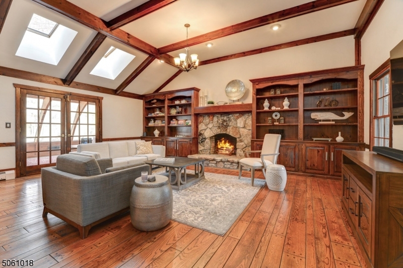 600 North Monroe Street Ridgewood, NJ 07450 - Photo 5 of 18 a living room with furniture and a fireplace