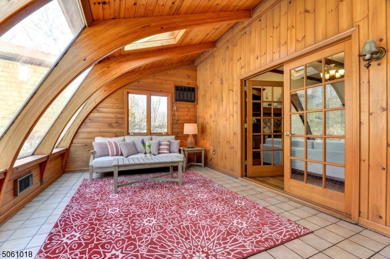 600 North Monroe Street Ridgewood, NJ 07450 - Photo 6 of 18 a living room with a couch and next to a window