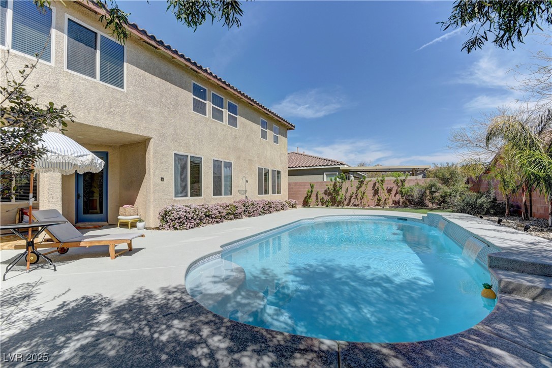 9992 South Sky Parlor Road Las Vegas, NV 89178 - Photo 38 of 42 View of pool with fence, a fenced in pool, and a patio
