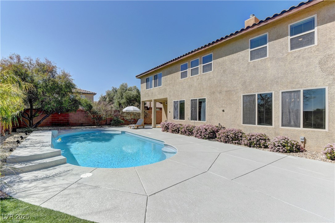 9992 South Sky Parlor Road Las Vegas, NV 89178 - Photo 41 of 42 View of swimming pool with a fenced in pool, a patio area, and a fenced backyard
