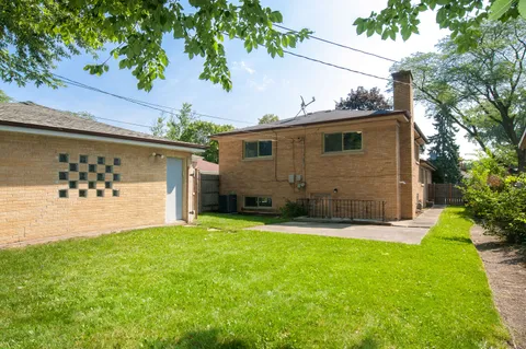 a view of backyard with green space