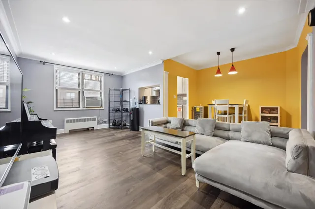 a living room with furniture and a window