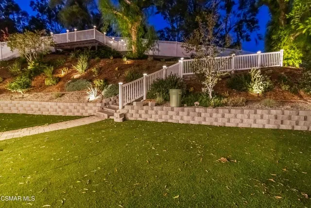 a view of a balcony with an outdoor space