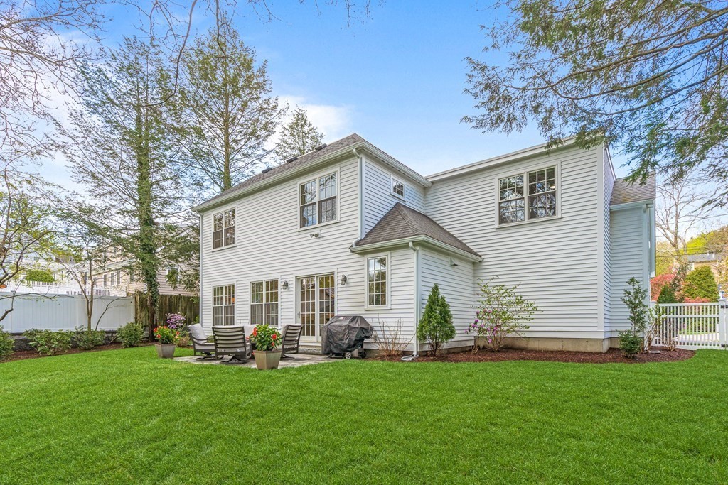 19 River Glen Road Wellesley, MA 02481 - Photo 30 of 31 a view of a house with a yard