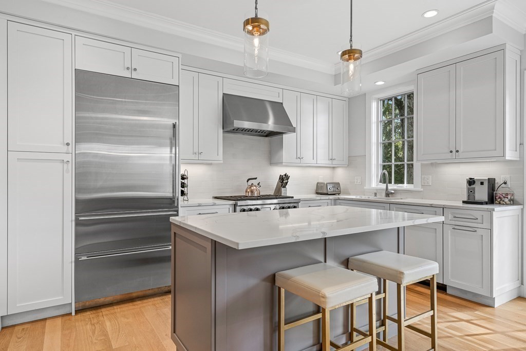 19 River Glen Road Wellesley, MA 02481 - Photo 7 of 31 a kitchen with a sink cabinets and window