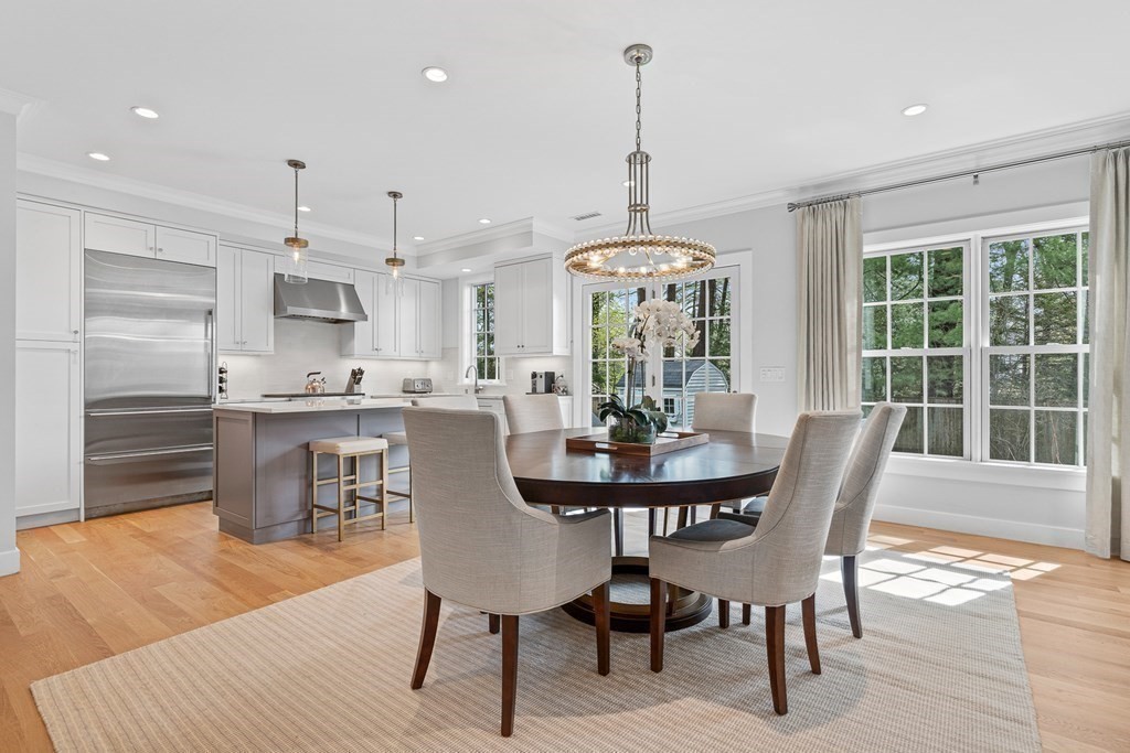 19 River Glen Road Wellesley, MA 02481 - Photo 9 of 31 a view of a dining room with furniture window and wooden floor