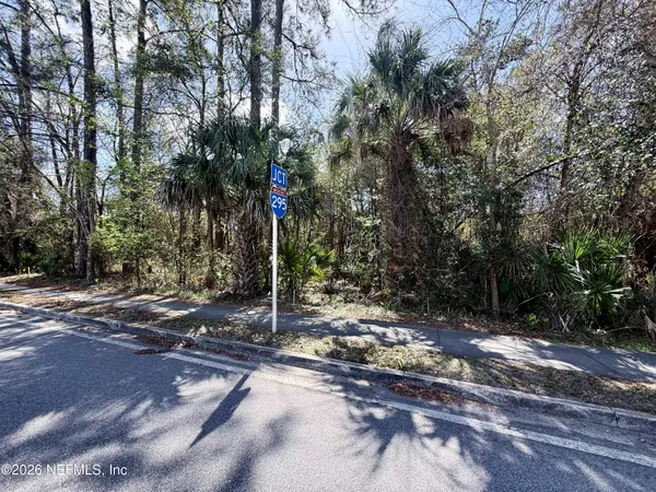 a view of swimming pool with a yard