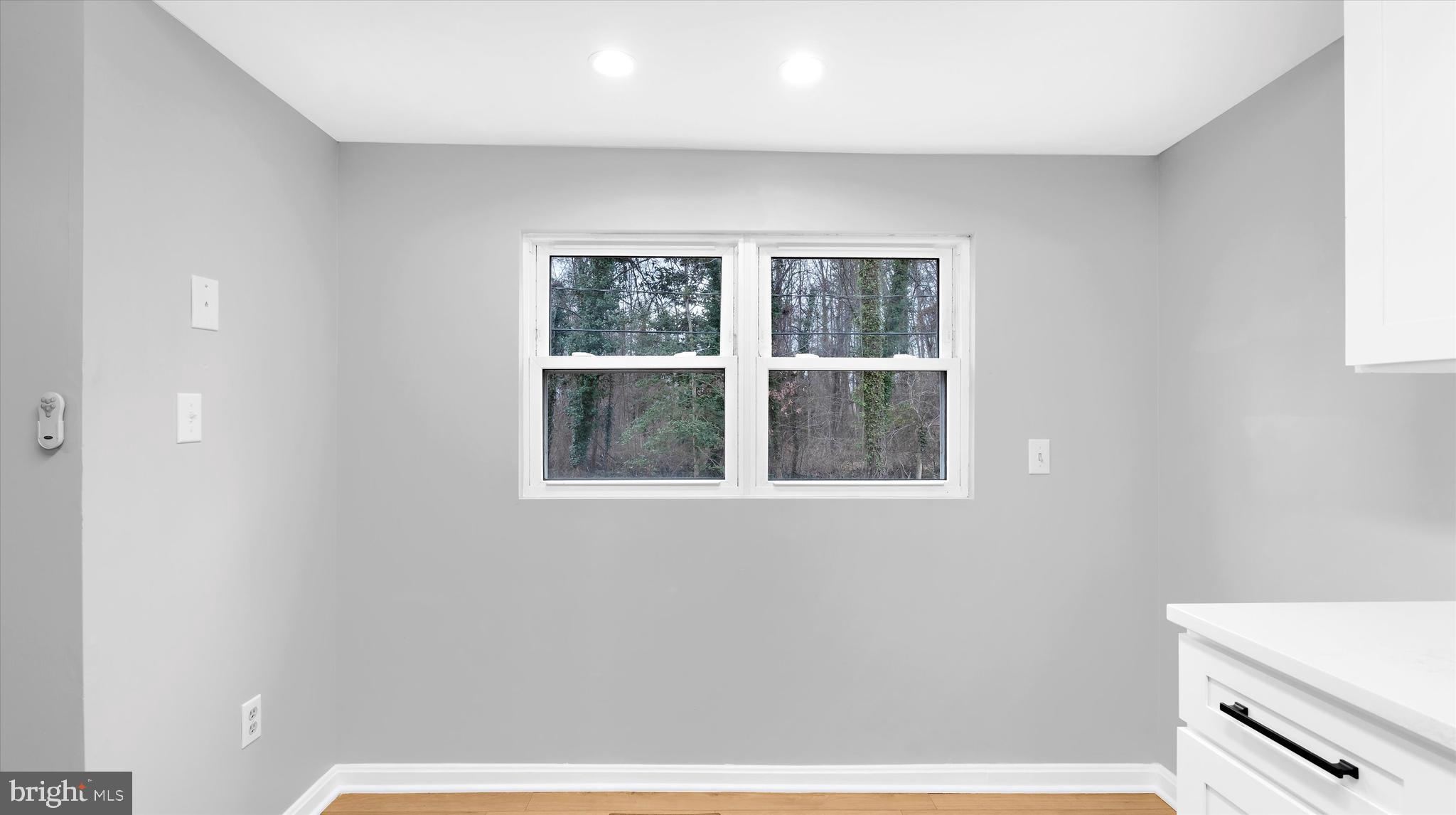 8009 Nolcrest Road Glen Burnie, MD 21061 - Photo 13 of 35 a view of kitchen and wooden floor