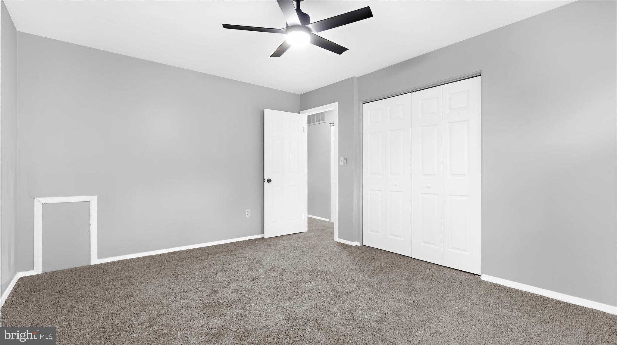 8009 Nolcrest Road Glen Burnie, MD 21061 - Photo 14 of 35 a view of an empty room