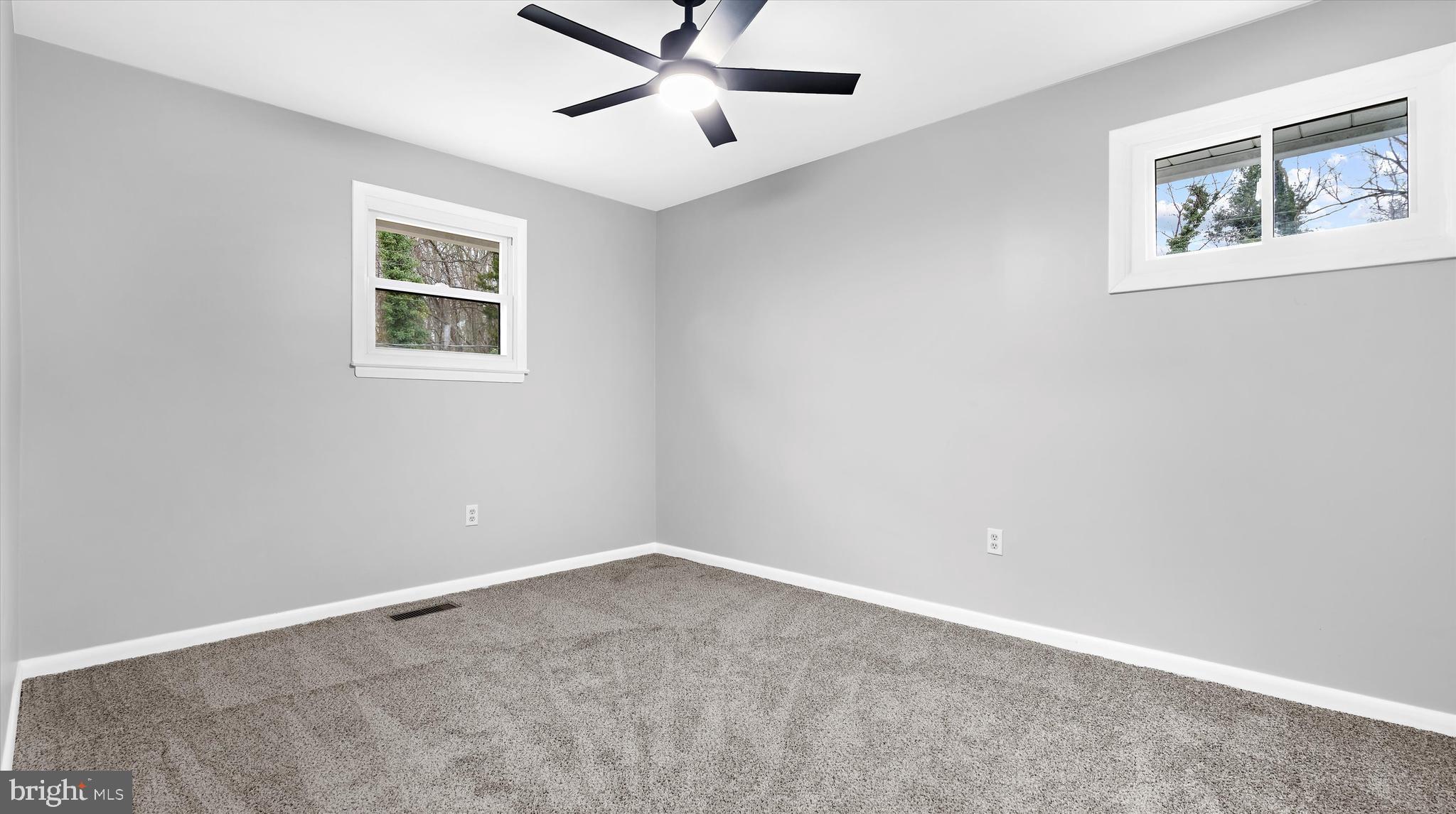 8009 Nolcrest Road Glen Burnie, MD 21061 - Photo 20 of 35 a view of an empty room with a window