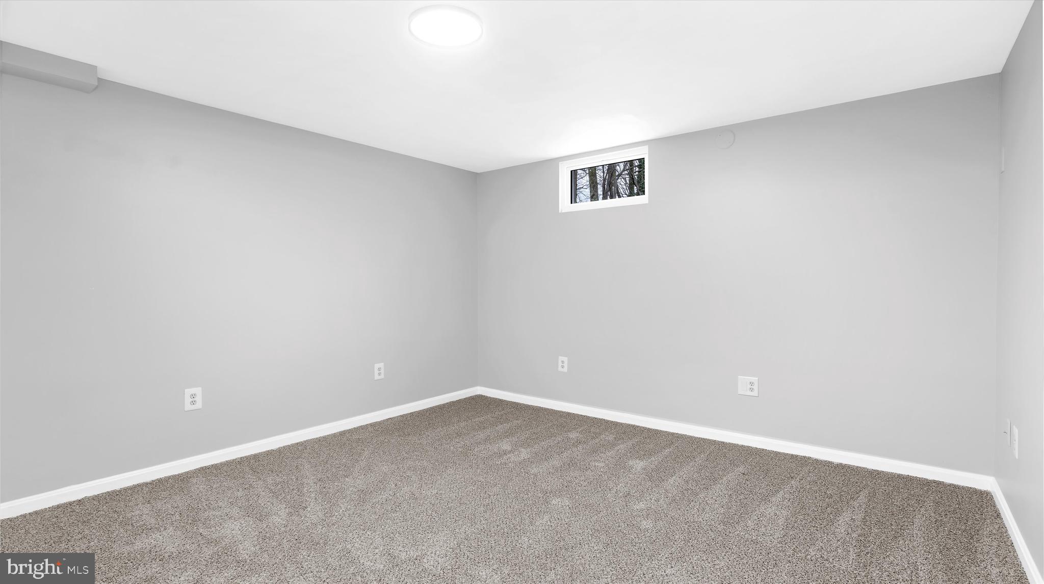 8009 Nolcrest Road Glen Burnie, MD 21061 - Photo 21 of 35 a view of an empty room