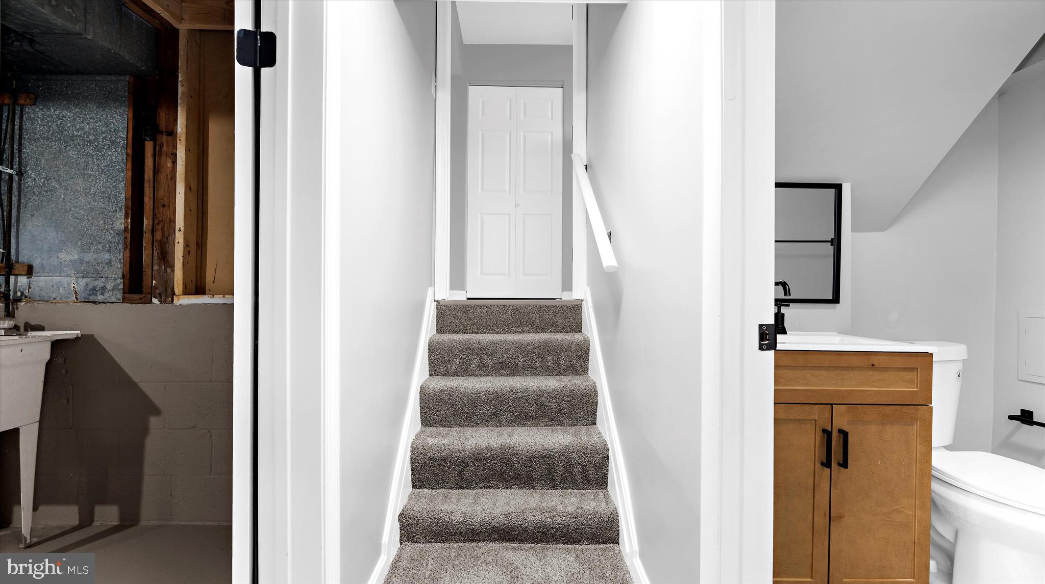 8009 Nolcrest Road Glen Burnie, MD 21061 - Photo 23 of 35 a view of front door with stairs