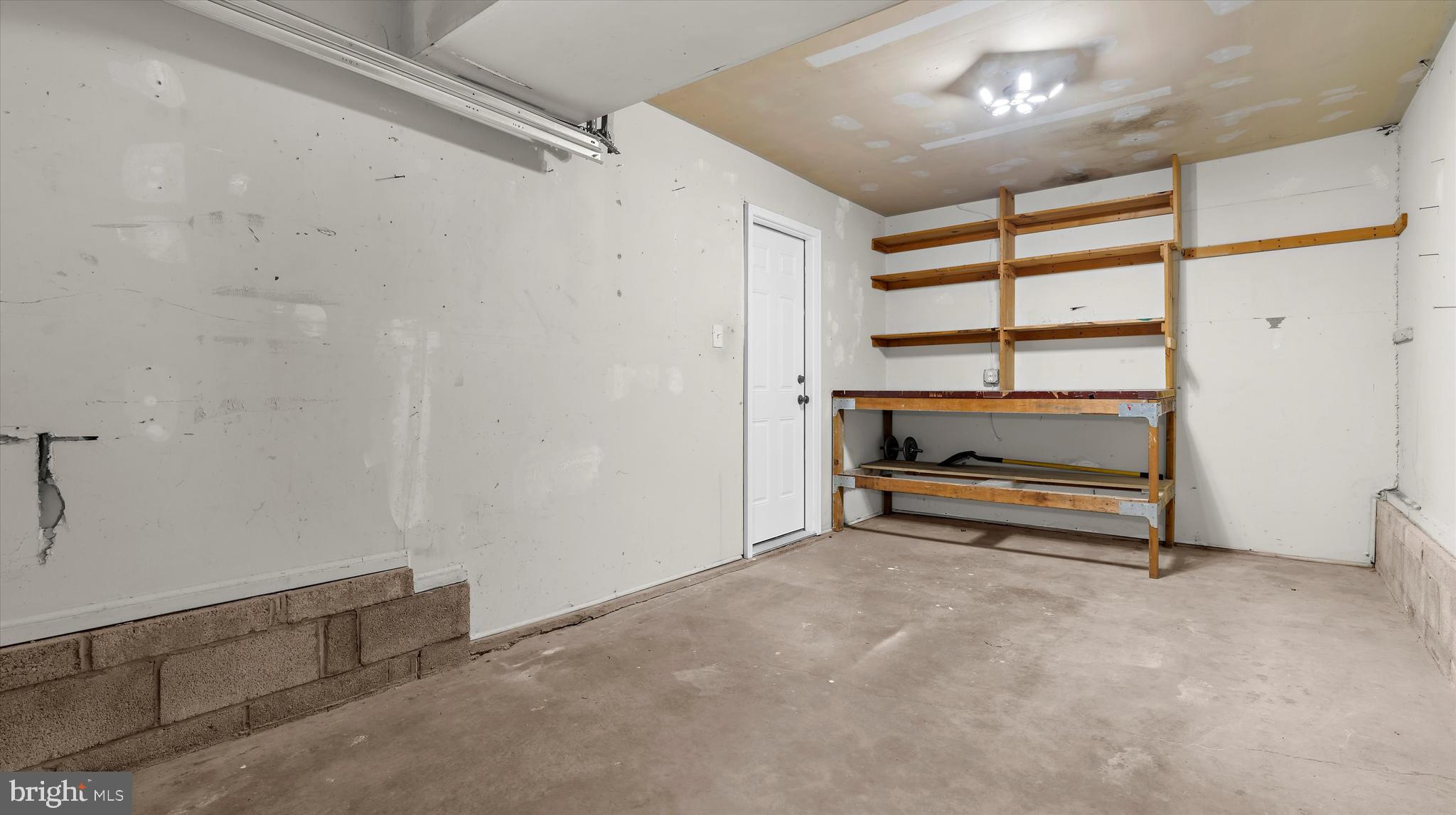 8009 Nolcrest Road Glen Burnie, MD 21061 - Photo 29 of 35 a view of an empty room with a window