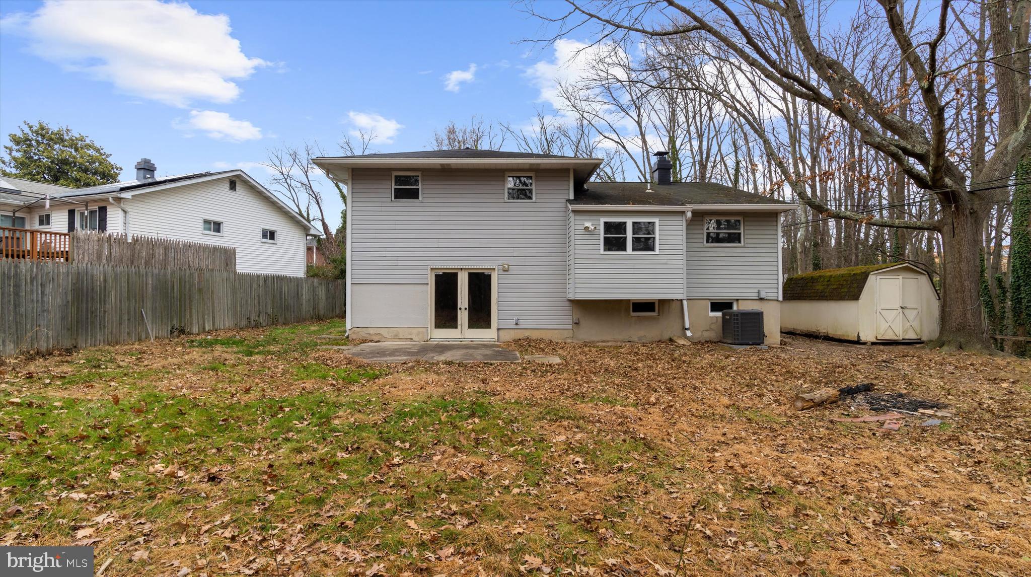 8009 Nolcrest Road Glen Burnie, MD 21061 - Photo 33 of 35 a front view of a house with a yard