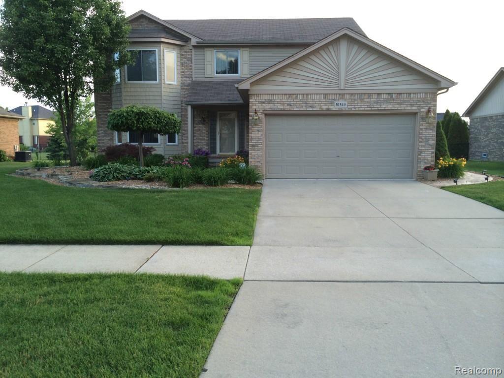 51549 Promenade Lane New Baltimore, MI 48047 - Photo 1 of 30 front pic use.jpg