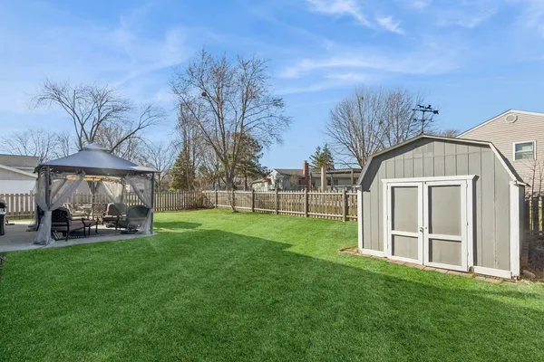 a view of a front of house with a yard