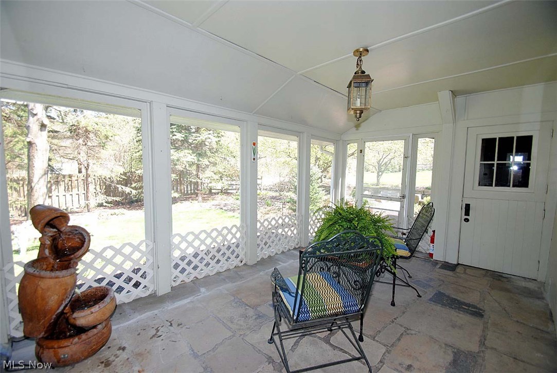 9923 Fairmount Road Newbury, OH 44065 - Photo 15 of 35 FRONT SCREENED PORCH JUST OFF KITCHEN AND FAMILY ROOM