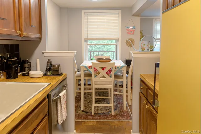 a view of a kitchen with a window